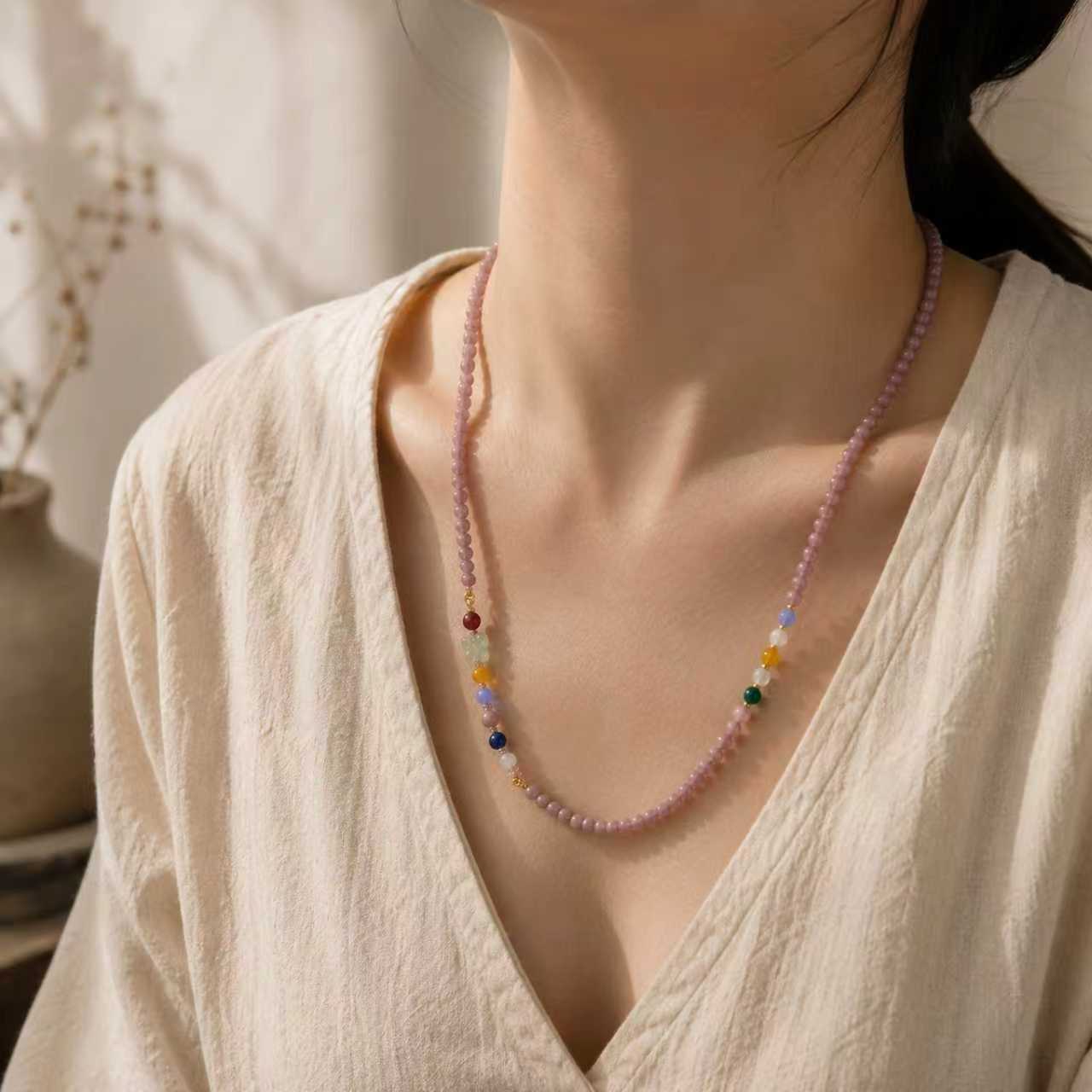 Botanical scent necklace worn around the neck